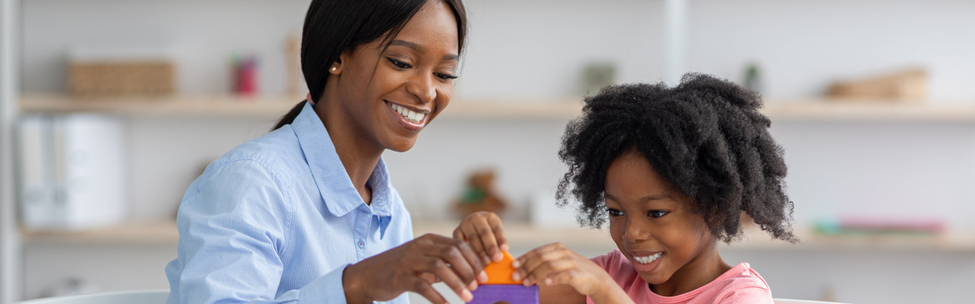 caregiver assisting a kid